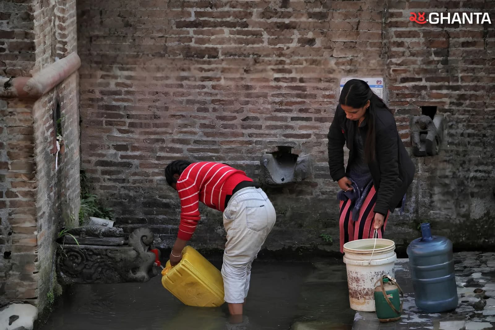 People collecting water in jars, highlighting growing concerns over how safe the water really is.