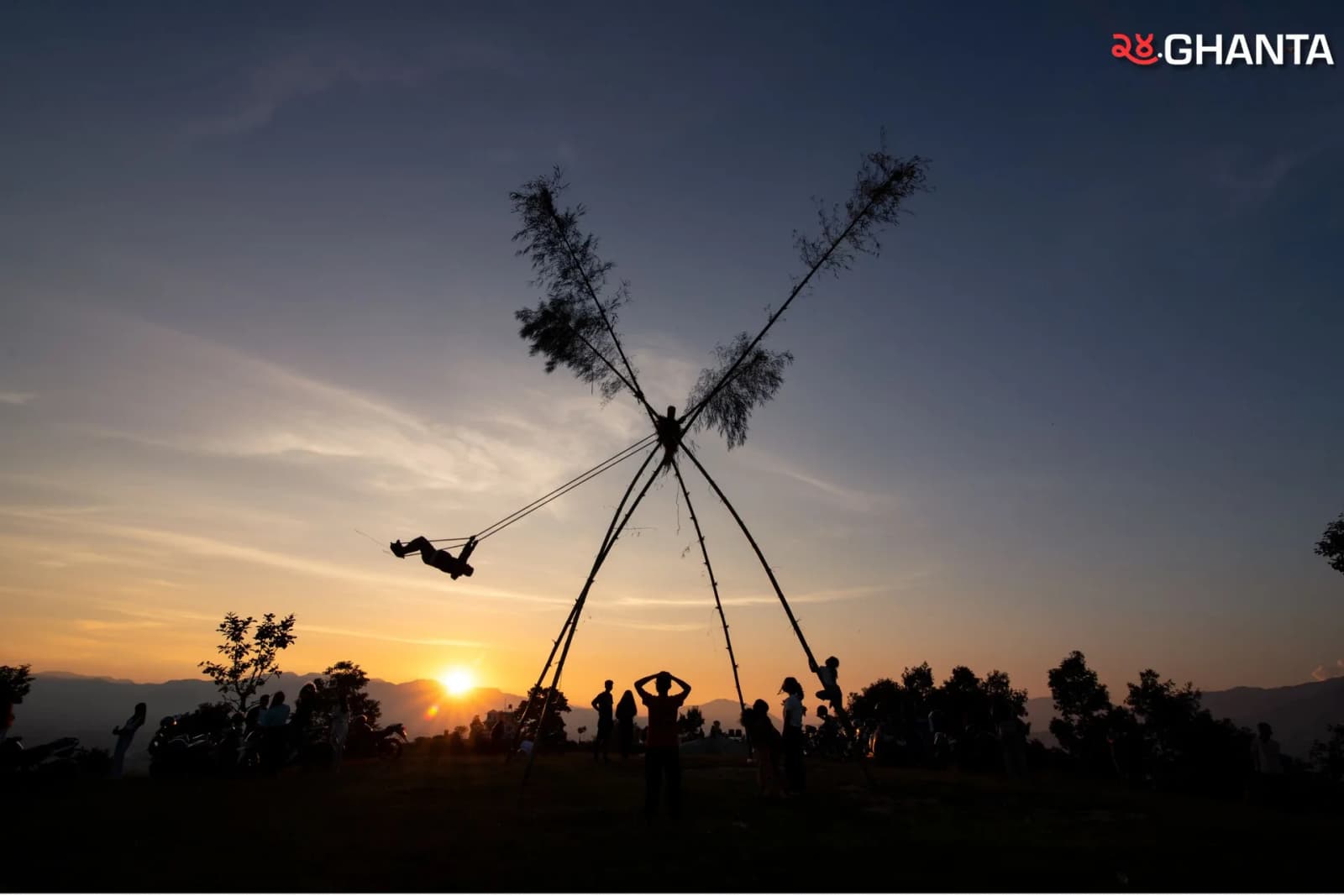 People enjoying Dashain by playing on traditional bamboo swings, celebrating the festival with joy and togetherness.