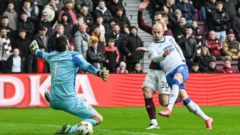 McCart scores two own goals while Rangers triumph over Hearts